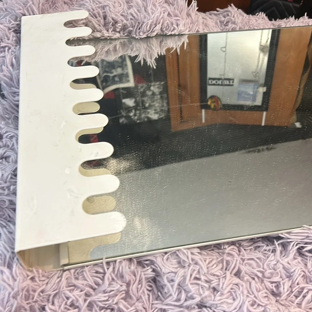 hanging door mirror, has some stains, easy to hang, medium size mirror